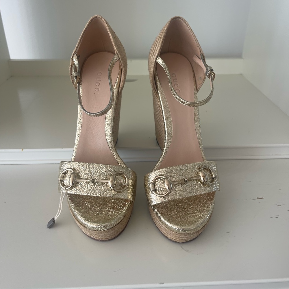 AUTHENTIC GUCCI GOLD ESPADRILLE WEDGES 5 inch wedge with 1 inch platform.